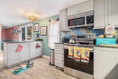 Welcome to your new oasis in the desirable Windjammer Village on Indian Wells Golf Course in South Carolina - for sale on GolfHomes.com, golf home, golf lot