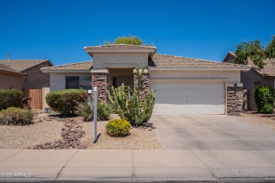 This beautiful home is on a cul-de-sac and has a rock front on on The Golf Club At Johnson Ranch in Arizona - for sale on GolfHomes.com, golf home, golf lot