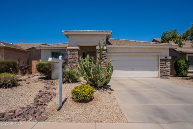 This beautiful home is on a cul-de-sac and has a rock front on on The Golf Club At Johnson Ranch in Arizona - for sale on GolfHomes.com, golf home, golf lot