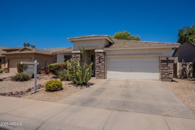 This beautiful home is on a cul-de-sac and has a rock front on on The Golf Club At Johnson Ranch in Arizona - for sale on GolfHomes.com, golf home, golf lot