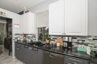 Welcome home to this beautiful 3 bedroom, 2 bath, 2 car garage on St. Lucie Trail Golf Club in Florida - for sale on GolfHomes.com, golf home, golf lot