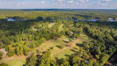 Tucked away in the serene, gated community of Holly Lake Ranch on Holly Lake Ranch Golf Club in Texas - for sale on GolfHomes.com, golf home, golf lot