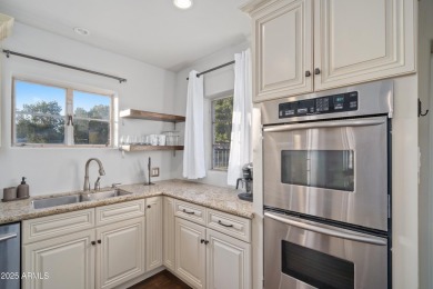 Gorgeous, updated home WITH CASITA on palm tree lined street in on Encanto 18 Golf Course in Arizona - for sale on GolfHomes.com, golf home, golf lot