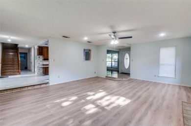 New flooring in living room, kitchen 2 bedrooms and 2 bathrooms on Texas Rangers Golf Club  in Texas - for sale on GolfHomes.com, golf home, golf lot