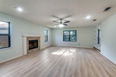 New flooring in living room, kitchen 2 bedrooms and 2 bathrooms on Texas Rangers Golf Club  in Texas - for sale on GolfHomes.com, golf home, golf lot