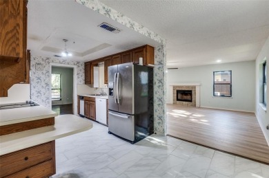 New flooring in living room, kitchen 2 bedrooms and 2 bathrooms on Texas Rangers Golf Club  in Texas - for sale on GolfHomes.com, golf home, golf lot
