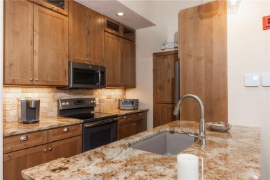 The Pines Condo 2145 -- A fully remodeled mountain retreat in on The River Course At Keystone in Colorado - for sale on GolfHomes.com, golf home, golf lot