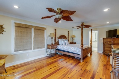 Waterfront 3-bed, 2.5-bath home in Timber Ridge with private on Pass Christian Isles Golf Club in Mississippi - for sale on GolfHomes.com, golf home, golf lot