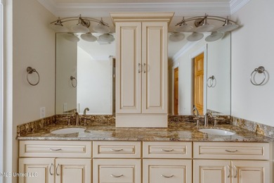 Waterfront 3-bed, 2.5-bath home in Timber Ridge with private on Pass Christian Isles Golf Club in Mississippi - for sale on GolfHomes.com, golf home, golf lot