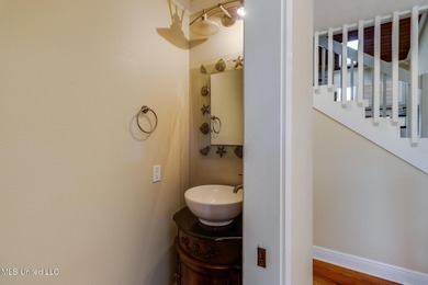 Waterfront 3-bed, 2.5-bath home in Timber Ridge with private on Pass Christian Isles Golf Club in Mississippi - for sale on GolfHomes.com, golf home, golf lot