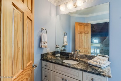 Waterfront 3-bed, 2.5-bath home in Timber Ridge with private on Pass Christian Isles Golf Club in Mississippi - for sale on GolfHomes.com, golf home, golf lot