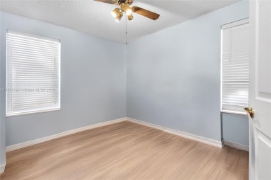 Spacious and rarely available corner unit available, 3 bedroom on Sunrise Lakes Phase IV Golf Course in Florida - for sale on GolfHomes.com, golf home, golf lot