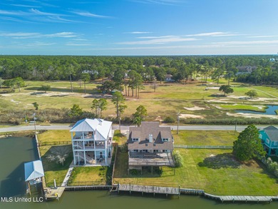 Waterfront 3-bed, 2.5-bath home in Timber Ridge with private on Pass Christian Isles Golf Club in Mississippi - for sale on GolfHomes.com, golf home, golf lot
