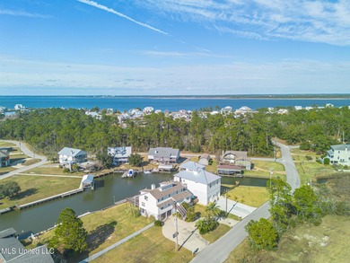 Waterfront 3-bed, 2.5-bath home in Timber Ridge with private on Pass Christian Isles Golf Club in Mississippi - for sale on GolfHomes.com, golf home, golf lot