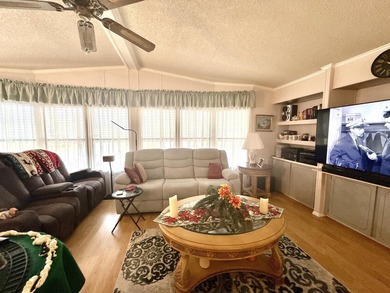 This charming 2BR/2BA home in Barefoot bay, combines comfortable on Barefoot Bay Golf Course in Florida - for sale on GolfHomes.com, golf home, golf lot