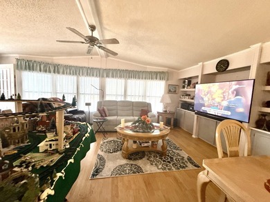 This charming 2BR/2BA home in Barefoot bay, combines comfortable on Barefoot Bay Golf Course in Florida - for sale on GolfHomes.com, golf home, golf lot