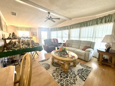 This charming 2BR/2BA home in Barefoot bay, combines comfortable on Barefoot Bay Golf Course in Florida - for sale on GolfHomes.com, golf home, golf lot