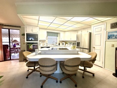 This charming 2BR/2BA home in Barefoot bay, combines comfortable on Barefoot Bay Golf Course in Florida - for sale on GolfHomes.com, golf home, golf lot