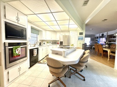 This charming 2BR/2BA home in Barefoot bay, combines comfortable on Barefoot Bay Golf Course in Florida - for sale on GolfHomes.com, golf home, golf lot