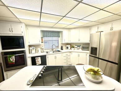 This charming 2BR/2BA home in Barefoot bay, combines comfortable on Barefoot Bay Golf Course in Florida - for sale on GolfHomes.com, golf home, golf lot