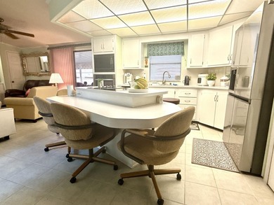 This charming 2BR/2BA home in Barefoot bay, combines comfortable on Barefoot Bay Golf Course in Florida - for sale on GolfHomes.com, golf home, golf lot