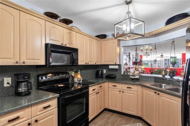 Spacious and rarely available corner unit available, 3 bedroom on Sunrise Lakes Phase IV Golf Course in Florida - for sale on GolfHomes.com, golf home, golf lot