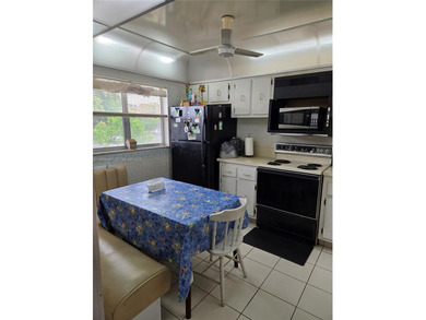 Spacious 2-bedroom, 2-bathroom second-floor condo located in a on Colony West Country Club in Florida - for sale on GolfHomes.com, golf home, golf lot