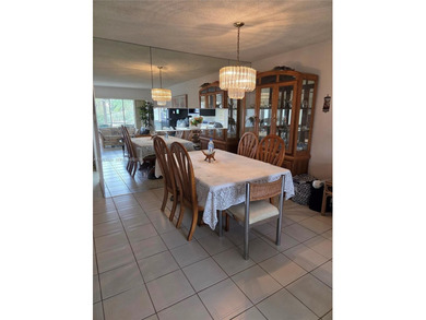 Spacious 2-bedroom, 2-bathroom second-floor condo located in a on Colony West Country Club in Florida - for sale on GolfHomes.com, golf home, golf lot