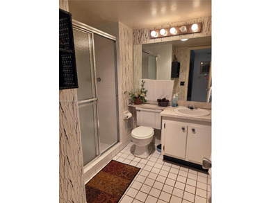 Spacious 2-bedroom, 2-bathroom second-floor condo located in a on Colony West Country Club in Florida - for sale on GolfHomes.com, golf home, golf lot