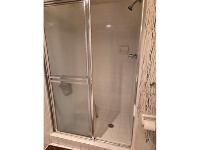 Spacious 2-bedroom, 2-bathroom second-floor condo located in a on Colony West Country Club in Florida - for sale on GolfHomes.com, golf home, golf lot