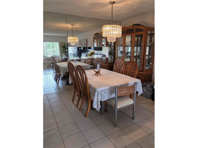 Spacious 2-bedroom, 2-bathroom second-floor condo located in a on Colony West Country Club in Florida - for sale on GolfHomes.com, golf home, golf lot