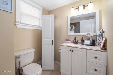 Welcome home to this charming 2-bedroom, 2-bath residence filled on Amsterdam Municipal Golf Course in New York - for sale on GolfHomes.com, golf home, golf lot