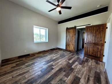 Extremely Low AC bills - $48 in June, $59 in July, set at 72 on Hilltop Lakes Resort Golf Club in Texas - for sale on GolfHomes.com, golf home, golf lot