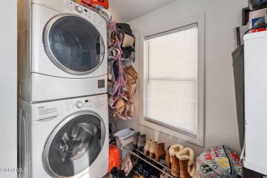 Welcome home to this charming 2-bedroom, 2-bath residence filled on Amsterdam Municipal Golf Course in New York - for sale on GolfHomes.com, golf home, golf lot