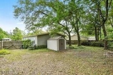 Welcome to this beautifully updated double wide mobile home on Diamondhead Country Club in Mississippi - for sale on GolfHomes.com, golf home, golf lot