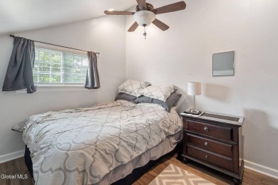 Welcome home to this charming 2-bedroom, 2-bath residence filled on Amsterdam Municipal Golf Course in New York - for sale on GolfHomes.com, golf home, golf lot