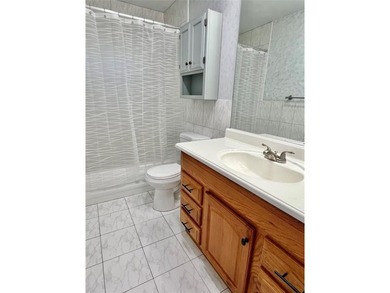 Well kept 3BR/2BA pool home in desirable west Sunrise community on Sunrise Lakes Phase III in Florida - for sale on GolfHomes.com, golf home, golf lot