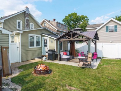 Welcome home to this charming 2-bedroom, 2-bath residence filled on Amsterdam Municipal Golf Course in New York - for sale on GolfHomes.com, golf home, golf lot