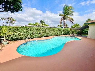 Well kept 3BR/2BA pool home in desirable west Sunrise community on Sunrise Lakes Phase III in Florida - for sale on GolfHomes.com, golf home, golf lot