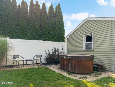 Welcome home to this charming 2-bedroom, 2-bath residence filled on Amsterdam Municipal Golf Course in New York - for sale on GolfHomes.com, golf home, golf lot