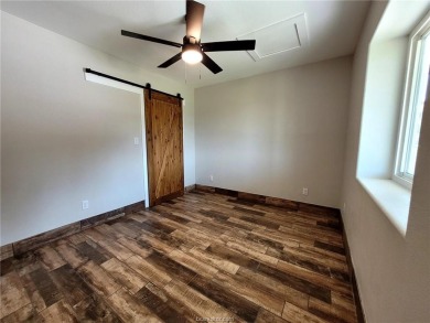 Extremely Low AC bills - $48 in June, $59 in July, set at 72 on Hilltop Lakes Resort Golf Club in Texas - for sale on GolfHomes.com, golf home, golf lot