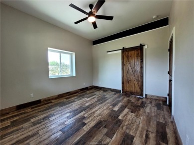 Extremely Low AC bills - $48 in June, $59 in July, set at 72 on Hilltop Lakes Resort Golf Club in Texas - for sale on GolfHomes.com, golf home, golf lot