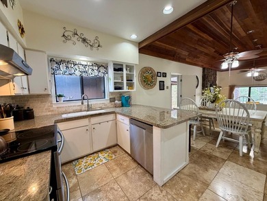 Tee off into paradise with this 2-bedroom, 3-bath condo! on Rayburn Country Club in Texas - for sale on GolfHomes.com, golf home, golf lot