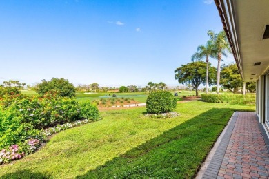 Sweeping golf course and lake views of the newly redesigned on Quail Ridge Golf Course and Country Club in Florida - for sale on GolfHomes.com, golf home, golf lot