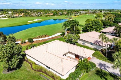 Sweeping golf course and lake views of the newly redesigned on Quail Ridge Golf Course and Country Club in Florida - for sale on GolfHomes.com, golf home, golf lot