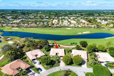 Sweeping golf course and lake views of the newly redesigned on Quail Ridge Golf Course and Country Club in Florida - for sale on GolfHomes.com, golf home, golf lot