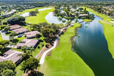 Sweeping golf course and lake views of the newly redesigned on Quail Ridge Golf Course and Country Club in Florida - for sale on GolfHomes.com, golf home, golf lot