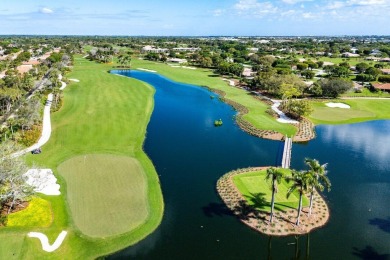 Sweeping golf course and lake views of the newly redesigned on Quail Ridge Golf Course and Country Club in Florida - for sale on GolfHomes.com, golf home, golf lot