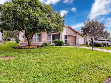 Lovely 2 bedroom home with split bedrooms, vaulted ceilings in on Summertree Golf Course in Florida - for sale on GolfHomes.com, golf home, golf lot