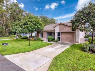 Lovely 2 bedroom home with split bedrooms, vaulted ceilings in on Summertree Golf Course in Florida - for sale on GolfHomes.com, golf home, golf lot